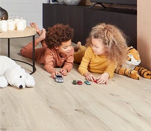 Can I install laminate flooring with underfloor heating and cooling?